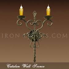 Just there to make sure you don't trip over the patio stairs. Iron Wall Sconce Spanish Hacienda Wrought Iron Sconces