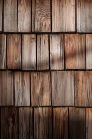 Fassade Aus Holzschindeln Auf Der Studlhutte In Osttirol Huttenarchitektur Holzschindeln Holzverkleidung Fassade Holzarchitektur