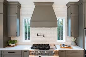 We did not find results for: Dark Gray Bead Board Range Hood White Glazed Subway Tiles And An Oil Rubbed Bronze Swing Arm P Cabin Kitchens Modern Farmhouse Kitchens Kitchen Cabinet Design