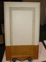 Measure your cabinet door to determine how much molding you'll need. Home Search