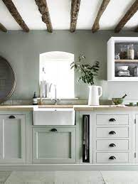 White Farmhouse Sink With Muted Green Cabinets Kitchen Kitchens Kitchenideas Modernkitchen Top Kitchen Paint Colors Kitchen Design Green Kitchen Cabinets