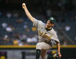 Oakland pitcher chris bassitt lies on the ground after being hit in the head by a line drive from brian goodwin of the chicago white sox. Oakland S Bassitt Notches First Win Of Season At Arizona