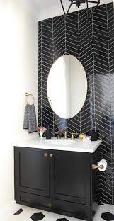 Do we, collectively as a society, have a newfound respect for chevron? 11 Bathrooms With Black Herringbone Tiles