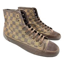 Leather high trainers Louis Vuitton Brown size 9.5 UK in Leather