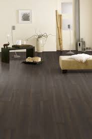 Bring out your home's exotic beauty with tropical teak, or ring in a new peaceful era with harmonious blends of mahogany and bronze. Tarkett Laminate Essentials 832 Wenge Modern Wideplank