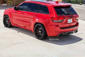 2020 Jeep Grand Cherokee Black And White Red Jeep Grand Cherokee On Gloss Black Strasse Wheels Featuring Red Calipers Jeep Grand Cherokee Red Jeep Jeep Grand