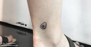 Avocado tattoo on the ankle.