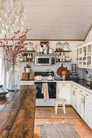 One doesn't really have to live in the woods or on a farm to capture the simplicity, cozinessyou and charm of a rustic repainting existing cabinets to lend a rustic look is one way to get that country kitchen feel, even when on a shoestring budget. 44 Attractive Kitchen Design Ideas On A Budget With Rustic Style Rustickitchen Kitchen Kitchendes Rustic Farmhouse Kitchen Rustic Kitchen Home Decor Kitchen