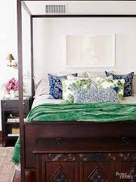 A black nightstand with chrome handles and a white nightstand featuring a glossy finish make suitable choices. With Its Clean White Walls Dark Wood Furniture And Neutral Bedding Jessica Alba S Family Home Is Honestly Beautiful Popsugar Home Photo 3