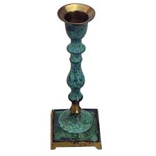 A contemporary twist on vintage candlestick holders, these brass coated stands are a wonderful way to light taper candles in your home. Astoria Grand Patina Small Brass Candlestick Wayfair