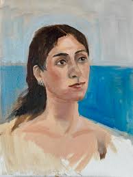 Painting at night in a dimly lit studio