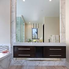 An antique design frame would work well for a classic bathroom theme. 13 Beautiful Mirrored Bathrooms