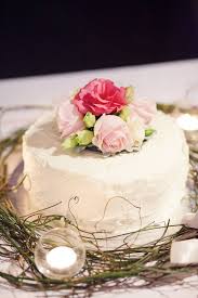 The choice of flowers and the way you position them on your cake will give it a very different pick organic fresh flowers in vibrant reads, yellows and blues for a fun and relaxed look. Queensland Brides Fresh Flower Cake Wedding Cake Fresh Flowers Wedding Cake Prices