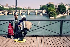 With all those gilded statues and river views. Hd Wallpaper France Paris Accordion Bridge Seine River Water Real People Wallpaper Flare