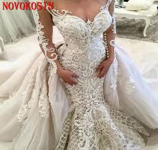 Mrzhu weddings & events dresses store has all kinds of luxury mermaid wedding dresses dubai muslim lace feather bridal gowns vestidos de novia 2021 couture mermaid wedding gown bride,lowime couture sequins pink celebrity dresses evening gown plus size 2021 new arrival luxury full sleeves mermaid party dress,green floor length formal evening dresses sequins arabic celebrity dresses 2021 red. 2019 New Dubai Arabic Luxury Mermaid Wedding Dresses With Detachable Train Lace Applique Long Illusion Sleeves Bridal Gown Buy At The Price Of 480 37 In Aliexpress Com Imall Com