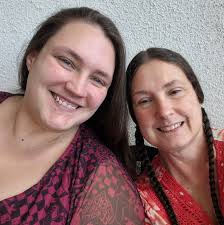 What company or method should I use to clean and service my hot tub?