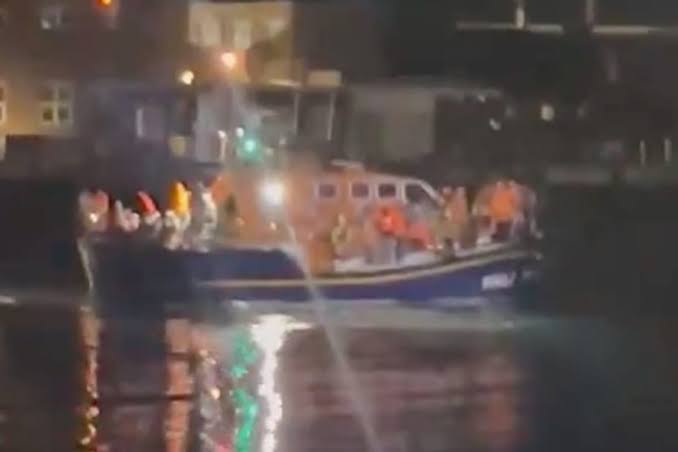 Reform councillor 'whipping up racism' with video of protestors hurling abuse at migrants on RNLI boat - AOL