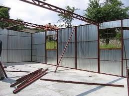 Garaj untuk menyimpan kereta boleh dibina dengan tangan, mengetahui ciri asas pembinaan dan rahsia para tuan. Garaj Dari Helaian Profesional Dengan Tangan Mereka Sendiri 70 Gambar Struktur Yang Diperbuat Daripada Logam Dengan Bumbung Yang Diperbuat Daripada Lantai Beralun Bagaimana Membuatnya Murah Dari Profil Tergalvani