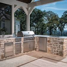 We wanted an outdoor kitchen but didn't want to pay a ridiculous price for one, so we grabbed a hammer and turned the grill we already had into the countertop is a unique horizontally laminated beam which was found at a local lumber yard. Built In Drop In Ice Chest Chiller For Outdoor Bbq Kitchen Saber Nz