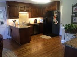Various styles are available, from flat panel and shaker style kitchen cabinets to more traditional options. Our Kitchen Layout Before After Emily A Clark