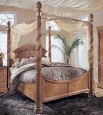 Wood Canopy Bed Design With Light Brown Finishes Home Interiors Canopy Bedroom Sets Canopy Bed Drapes Canopy Bedroom
