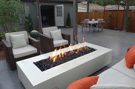Outdoor fire pit for garden 23inch fire bowl with spark screen and poker extra large deep rustproof fire brazier wood burning fire basket. Fire Pits Uk Warmth And Beauty During Cold Uk Evenings Fire Pit Landscaping Ideas Design Modern Outdoor Firepit Contemporary Fire Pit Fire Pit Landscaping