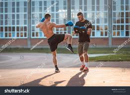 Two Athletic Young Men Boxing Men Training Outdoors Training Kickboxing Two Males Boxing Outdoors Sparring Trainin Boxing Training Kickboxing Athletic Men