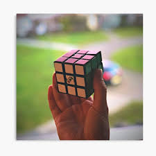 Read online books for free new release and bestseller Cool Solved Rubik S Cube With Blurry Background Poster By Boogwout Redbubble