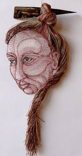 Ágnes Herczeg of Hungary, selects wood or ceramic pieces & augments them  with lace or macrame figures. See Blogroll for a link.