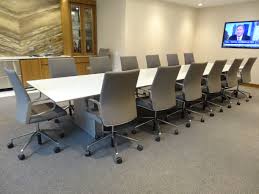 Prismatique Back Painted Glass Conference Table With Scissor Edge And Panel Bases Keilhaue Glass Conference Table Back Painted Glass Tempered Glass Table Top