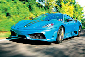 In the right corner the ferrari f430. Ferrari F430 Auto Express