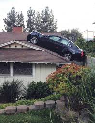 Man S Car Ends Up On Neighbor S Roof Funny Pictures Funny Captions Funny Photos