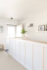 Diy Board And Batten What To Do With An Entryway Half Wall Half Walls Board And Batten Wall Railing