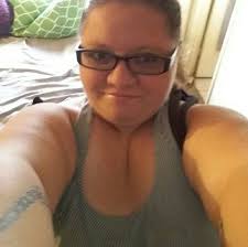 What is a good caption for a picture of a dachshund family in the rain?