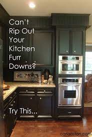 Can T Rip Out Your Kitchen S Furr Downs Do This Designed Kitchen Soffit Above Kitchen Cabinets Kitchen Remodel