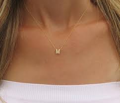 Each of our 18ct and 9ct gold pendants has a special meaning and a special story that has inspired its design. Tiny Gold Initial Necklace Gold Letter Necklace Gold Initial Etsy