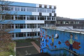Siegen: Drei Fraktionen werfen dem Schuldezernenten fehlende Neutralität  vor.