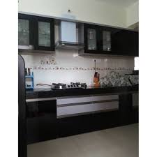Using black cabinets allows one to choose from practically any color theme or materials to get the look you desire. Wooden Straight Black Color Design Aluminium Modular Kitchen Rs 900 Square Feet Id 22006931733