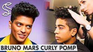 Originally intended for women, the pompadour haircut reappeared in modern history and made a name for itself when elvis wore it in the 50s. Curly Pomp Bruno Mars Pompadour Men S Hair Youtube