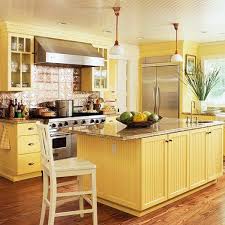 The wood base cabinets bring a country cottage feel without being overly rustic. Home Architec Ideas Kitchen Design Yellow Green