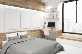 Cameretta gialla angolare wonder t11 con letto scorrevole, scrivania a parete con ruote, guardaroba battente e funzionale libreria terminale. Immagini Stock Angolo Della Camera Da Letto Interno Con Una Galleria Di Foto C E Un Tavolo Di Legno Due Librerie E Tre Grandi Poster Verticali Appesi Al Muro Rendering 3d Mock