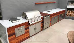 Feb 16, 2021 · this outdoor kitchen takes that peaceful feeling and creates a casual outdoor space using the corrugated tin for visual interest and a beautiful soundscape during stormy weather. Best Wood For Outdoor Kitchens Advantagelumber Blog