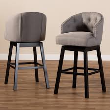 Swivel bar stools, to some extent, bring much convenience to your life. Baxton Studio Theron Transitional Gray Fabric Upholstered Wood Swivel Bar Stool