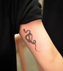 Snake tattoos have have been a stable motif in the tattoo industry ever. Best Snake Tattoos Tattoo Insider Tattoos Foot Tattoos Hip Tattoo