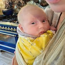 Welcome to the world, Laura Kate! Our sweet girl gave us a little scare  during delivery—she had the cord wrapped around her neck, and her heart  rate was dropping. But thanks to