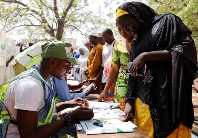 Nigerians cast ballots in delayed election after explosions, gunfire | PBS News Weekend