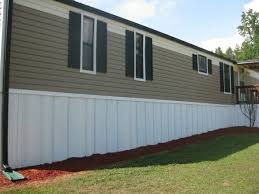 Reduce Mobile Home Heating Costs With These Upgrades Mobile Home Living Mobile Home Skirting Mobile Home Renovations Mobile Home Roof