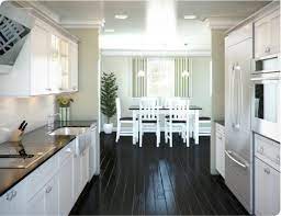 White Galley Kitchen Designs With Black Flooring Tile Kitchen Remodel Layout Kitchen Remodel Plans Kitchen Layout