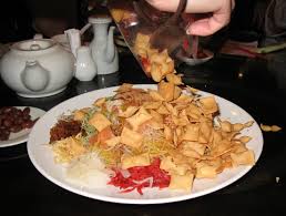 It is a fun and tasty salad symbolizing abundance, prosperity, and vigor. Yusheng Wikipedia