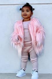 Khloe kardashian's daughter true is getting her fashionable taste directly from her mommy. True Thompson Pretty In Pink Unreal Fur Mini Me Jacket Celebrity Kids Fashion Cute Kids Fashion Jenner Kids